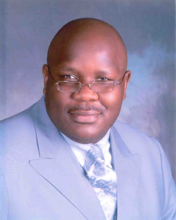 Portrait of Dr. Gilbert Evans, Chairman of the Palatka Housing Authority Board of Commissioners